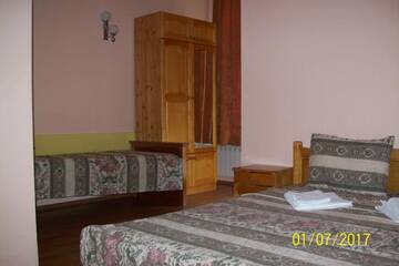 Фото номера Трехместный номер с балконом Гостевой дом Guest House Gergevana г. Велинград 4