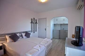 Фото номера Номер-студио с балконом Гостевой дом Saint Maria Guest House г. Велинград 5
