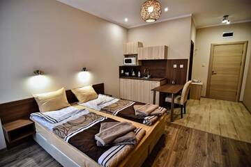 Фото номера Двухместный номер с 1 кроватью и балконом Гостевой дом Zarevata Guest House г. Велинград 6