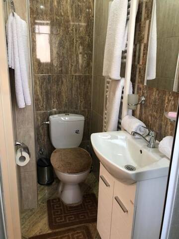 Фото номера Двухместный номер с 2 отдельными кроватями, вид на сад Гостевой дом Guest Rooms Popovi г. Велинград 7