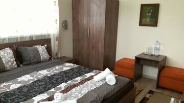 Фото номера Двухместный номер Делюкс с 1 кроватью и балконом Гостевой дом Guest House Radoychevi г. Велинград 4